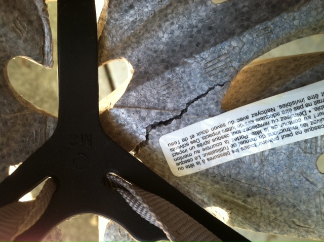Photo showing the crack in Tex's helmet.