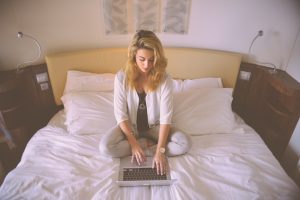 person-woman-hotel-laptop