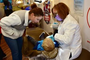 Young boy gets a free dental screening at Terrific Teeth Day.