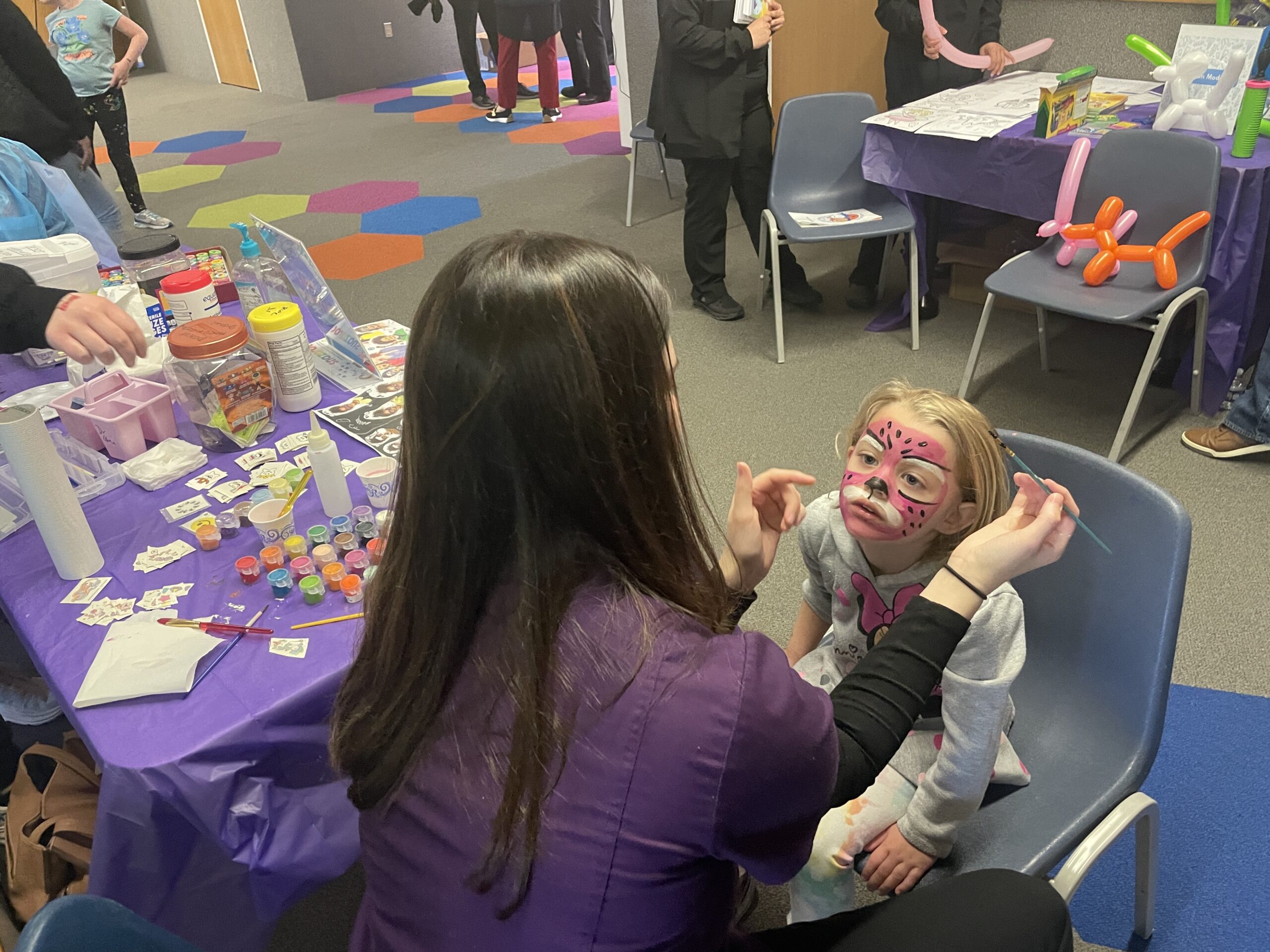 A child gets their face painted during Terrific Teeth Day 2025