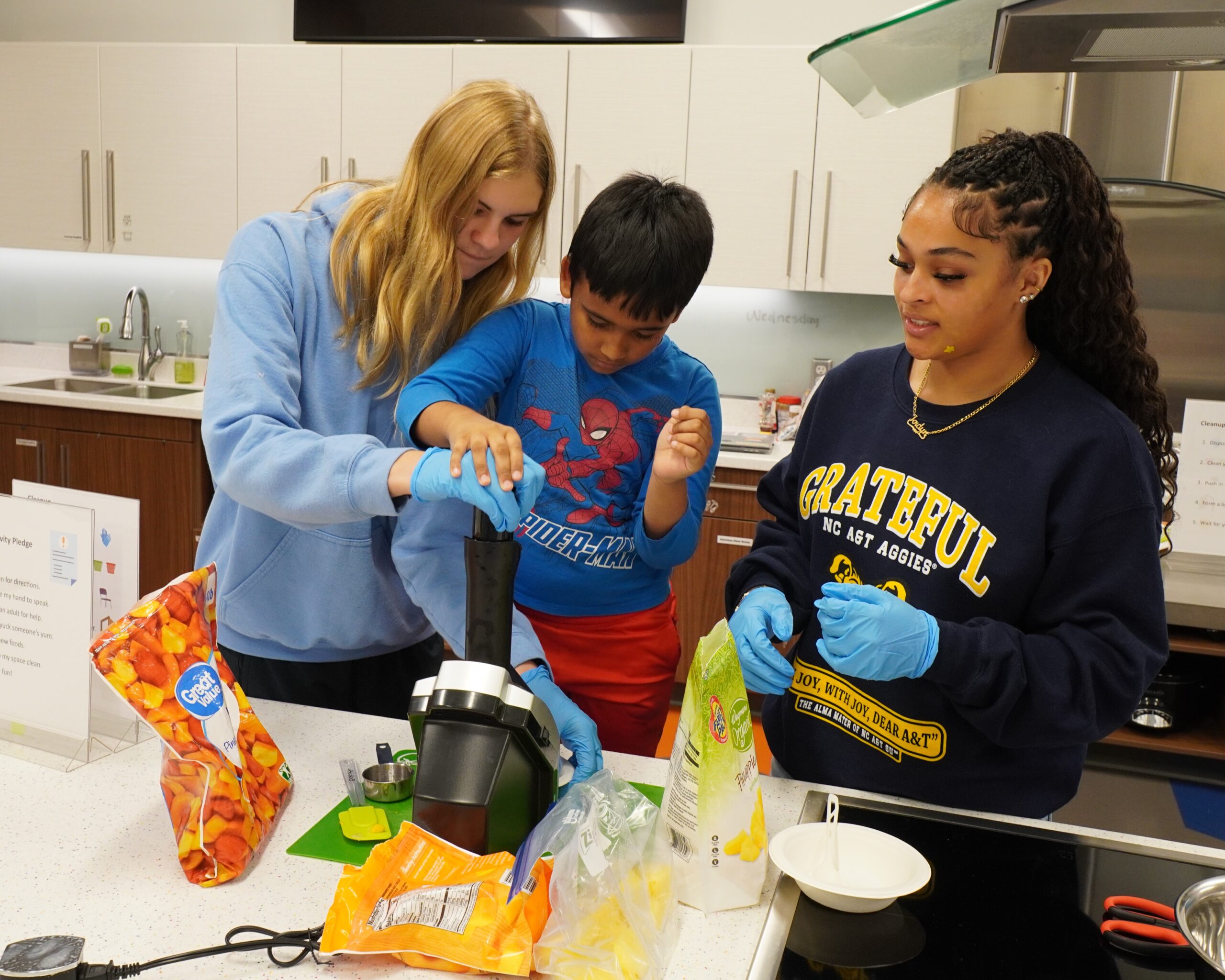 Child explores the Traffic Safety Course at the Poe Center during Camp PlayWELL