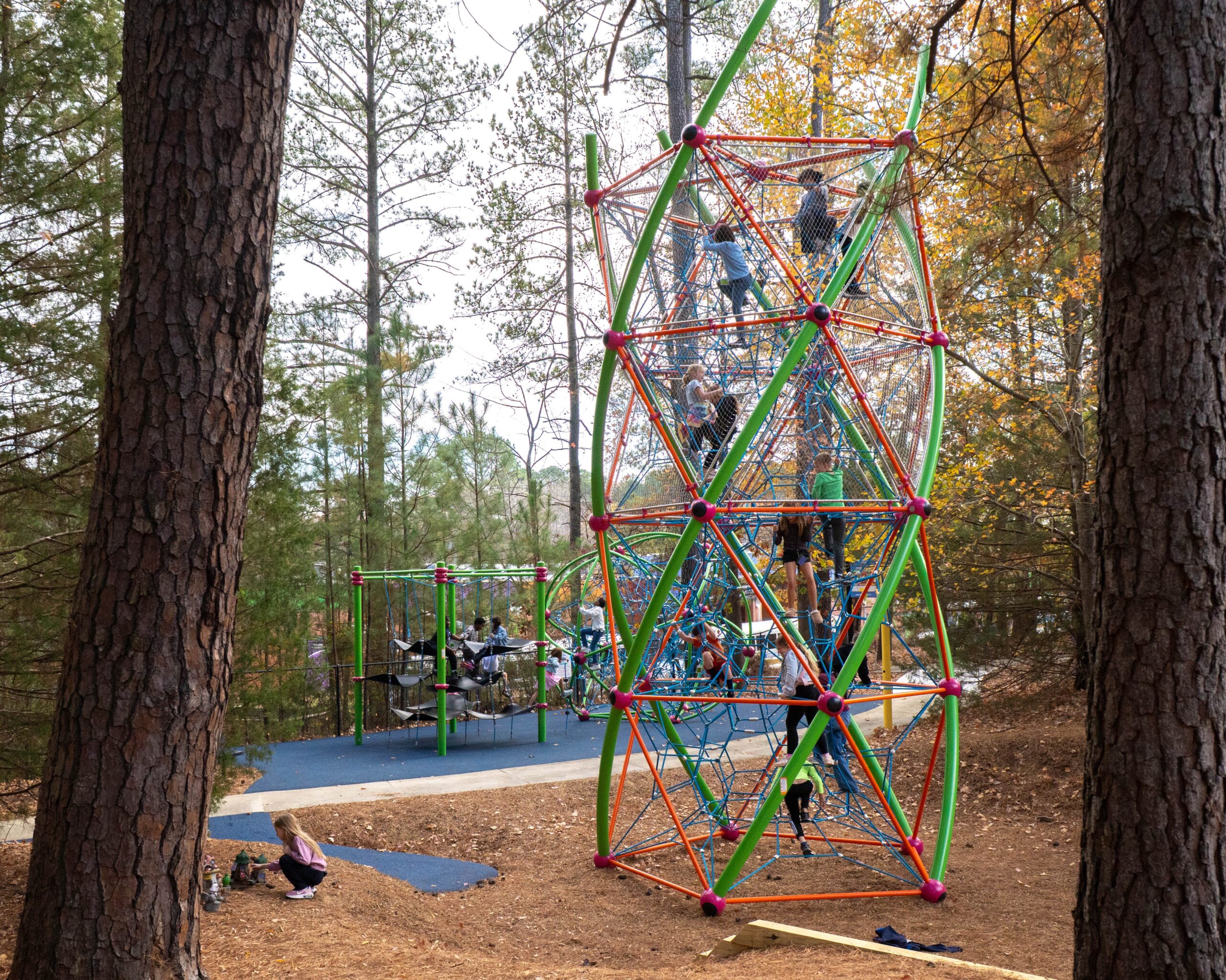 Child explores the Traffic Safety Course at the Poe Center during Camp PlayWELL