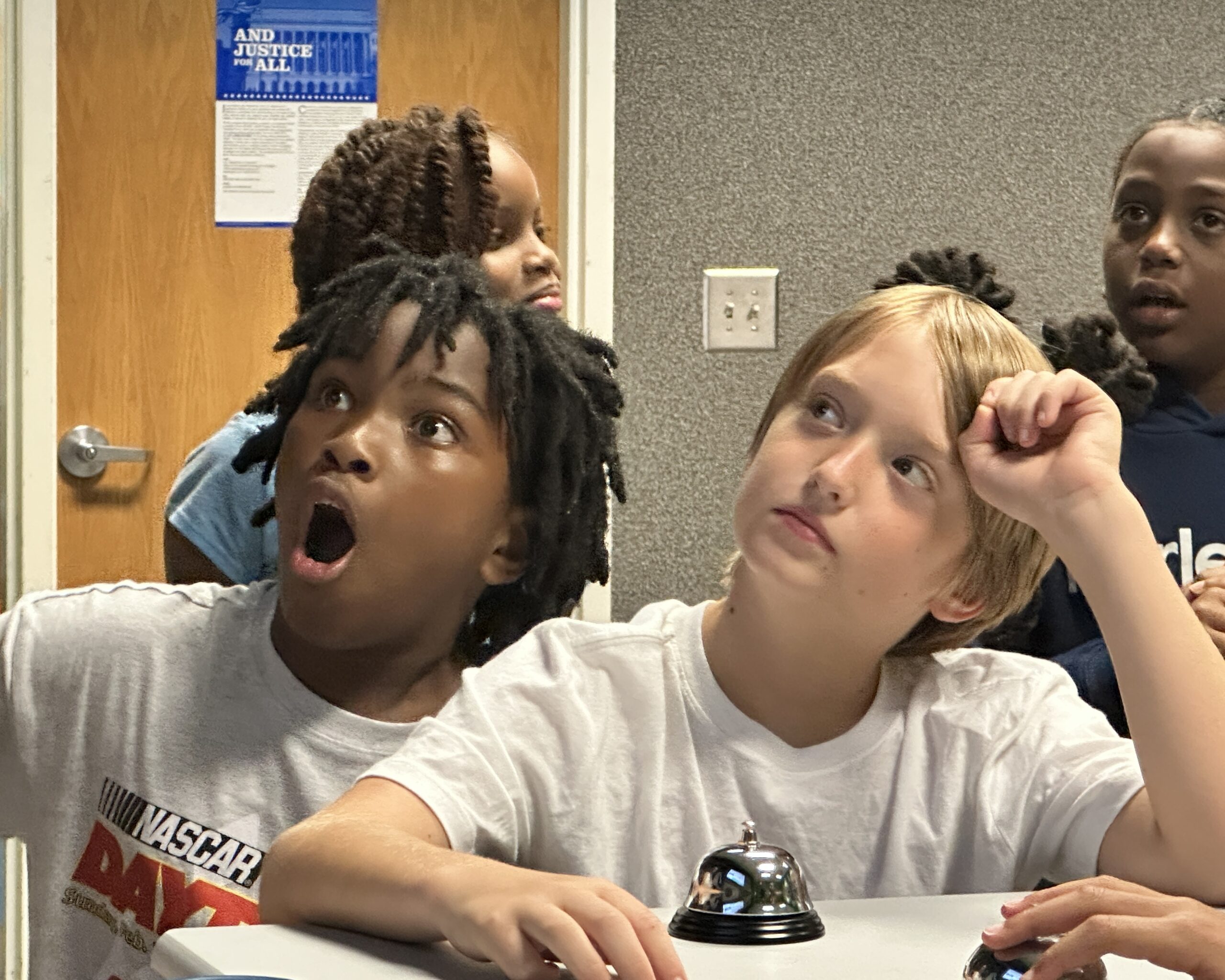 Child explores the Traffic Safety Course at the Poe Center during Camp PlayWELL